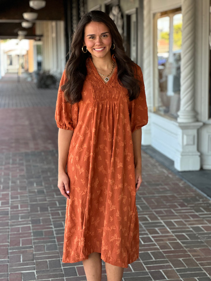 Jacquard Smocked Midi Dress in Rust