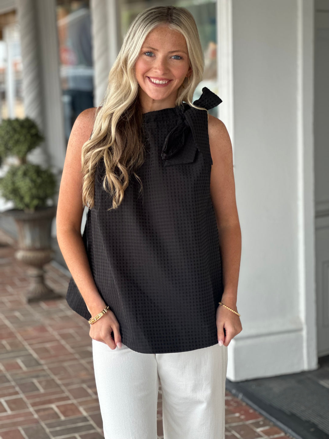 Ruffle Neck Tie Sleeveless Top in Black